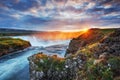 Godafoss waterfall at sunset. Fantastic landscape. Beautiful cumulus clouds. Iceland Europe Royalty Free Stock Photo