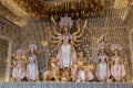 Goddess Durga idol at decorated Durga Puja pandal, shot at colored light, at Kolkata, West Bengal, India. Durga Puja is biggest Royalty Free Stock Photo