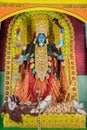 Idol of Goddess Maa Kali at a decorated puja pandal in Kolkata, India