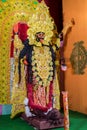 Idol of Goddess Maa Kali at a decorated puja pandal in Kolkata, India Royalty Free Stock Photo