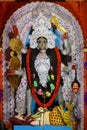 Idol of Goddess Maa Kali at a decorated puja pandal in Kolkata, India Royalty Free Stock Photo