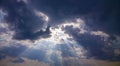 Gods light. Rays of light through dark clouds. sun shines from c