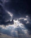 Gods light. Rays of light through dark clouds. sun shines from c