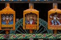 2007 Gods statues at wheel of chariot rath yatra of jagannath ; Puri ; Orissa ; India