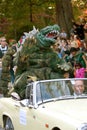 Godzilla Waves To Crowd In Halloween Parade Royalty Free Stock Photo
