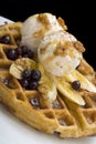 Gofre - belgian homemade waffles with ice cream, bananas and nuts