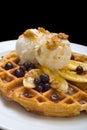 Gofre - belgian homemade waffles with ice cream, bananas and nuts
