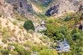 road with parked cars to Monastery of Geghard