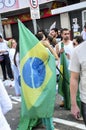 Protest against the government population on the street with flag of Brazil