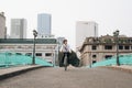 Going everywhere by his bike. Side view of young businessman loo Royalty Free Stock Photo