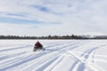 Going with snowmobile towards to mountain in Lapland Royalty Free Stock Photo