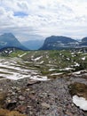 Going to the Sun Road, View of Landscape, snow fields In Glacier National Park around Logan Pass, Hidden Lake, Highline Trail, whi Royalty Free Stock Photo