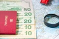 Going to travel. Passport, magnifier, red toy car and money on map. Save money on travel, planning for budget concept. Summer Royalty Free Stock Photo