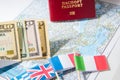 Going to travel. Passport, money, flags of Greece, UK, Italy, France on map. Save money on travel, planning for budget concept. Royalty Free Stock Photo