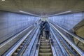 going up the escalator at the metro station Gammel Strand in Copenhagen