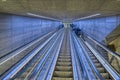 going up the escalator at the metro station Gammel Strand in Copenhagen