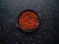 Goji berries on the black table. Top view. Royalty Free Stock Photo
