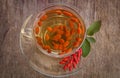 Goji fresh antioxidant tea in glass cup Royalty Free Stock Photo