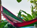 GOKARNA,KARNATAKA,INDIA-FEBUARY 8 2018:Young woman relaxes on a hammock,Gokarna beach. Royalty Free Stock Photo