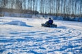 gokart taking corner on icy track at lake in Sweden