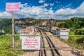 GOKTEIK, MYANMAR - NOVEMBER 30, 2016: Gate across the tracks at Gokteik (Gok Teik) viaduct on the railway line Mandalay - Hsipaw, Royalty Free Stock Photo