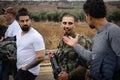 Golani soldier and his family smiling in the city of Golani Junction, Israel