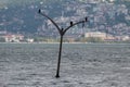 Golcuk - Turkey August 9,2018 . The street lamp sinking into the sea. Royalty Free Stock Photo
