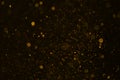 Gold abstract bokeh background. Explosion on black background Royalty Free Stock Photo