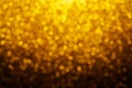 Gold abstract bokeh glitter vintage lights background. Royalty Free Stock Photo