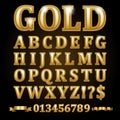 Gold alphabetical letters isolated on black Royalty Free Stock Photo