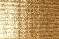 Gold aluminum foil texture. Royalty Free Stock Photo