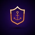 Gold Anchor inside shield icon isolated on black background. Vector Royalty Free Stock Photo