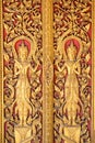 Gold Angels stripes Thai arts on door church Royalty Free Stock Photo