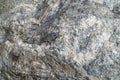 Gold antimony ore texture close-up. Mineral stone surface background