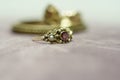 Gold antique ring with garnet and pearl Royalty Free Stock Photo