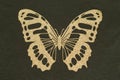 Gold applique in the form of a butterfly