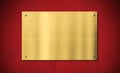 Gold award plaque or plate on red background