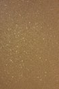 Gold background with microstructure and sparkles Royalty Free Stock Photo