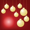 Gold ball hanging on red background in Christmas eve