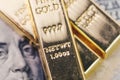 Gold bar, bullions or ingot stack on america US dollar banknote Royalty Free Stock Photo