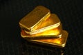 Gold bar on gross background scene. Royalty Free Stock Photo