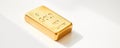 Gold bar resting on white surface with sunlight reflection Generative AI Royalty Free Stock Photo