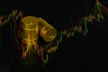 Gold barrel of oil on a Forex chart with Japanese Brent candles on a black background,