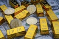 Gold bars and american one dollar bills. Scattered bitcoin digital cryptocurrency coin.