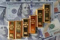 Gold bars arranged as a graph exponential on bank note . Royalty Free Stock Photo