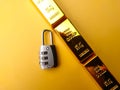 Gold bars and padlock Financial concept and conceptual image