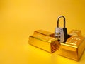 Gold bars and padlock Financial concept and conceptual image