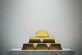 Gold bars pyramid, white wall Royalty Free Stock Photo