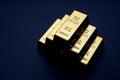 gold bars stacked in a pyramid shape. Shiny precious metals for investments or reserves.