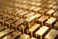 Gold bars stacked in rows. Royalty Free Stock Photo